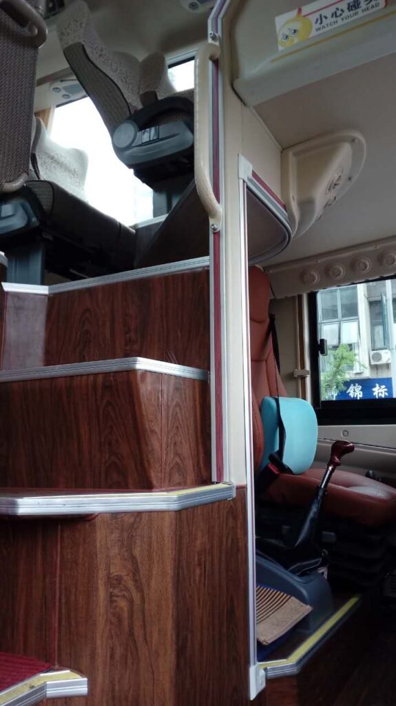Comfortable interior of a 54-seater private coach in Chongqing