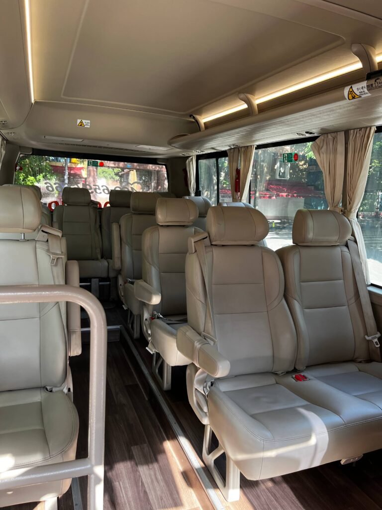 Comfortable seats inside a 14-seater Chongqing private minibus