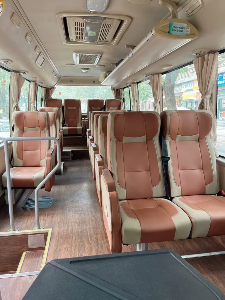 Comfortable seats inside a 19-seater Chongqing private minibus