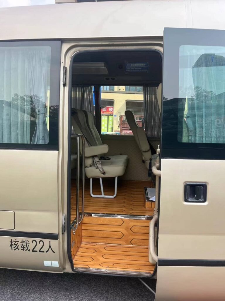 Passenger entrance of a 22-seater private minibus in Chongqing