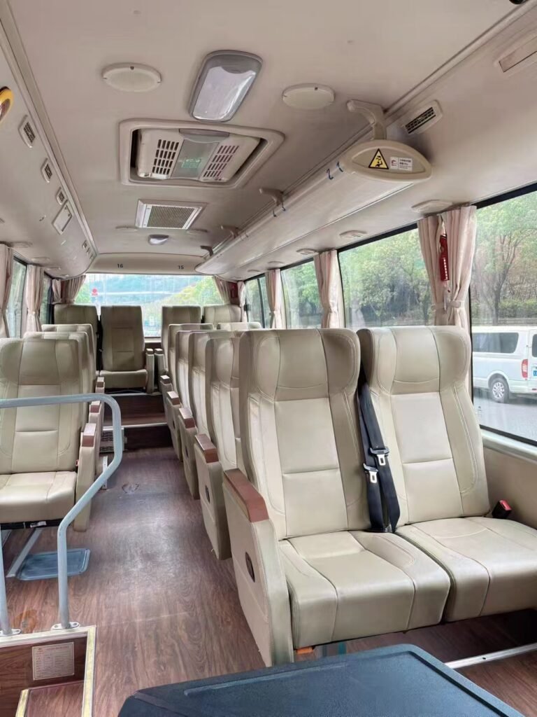 Spacious 19-seater minibus interior for Chongqing group tours