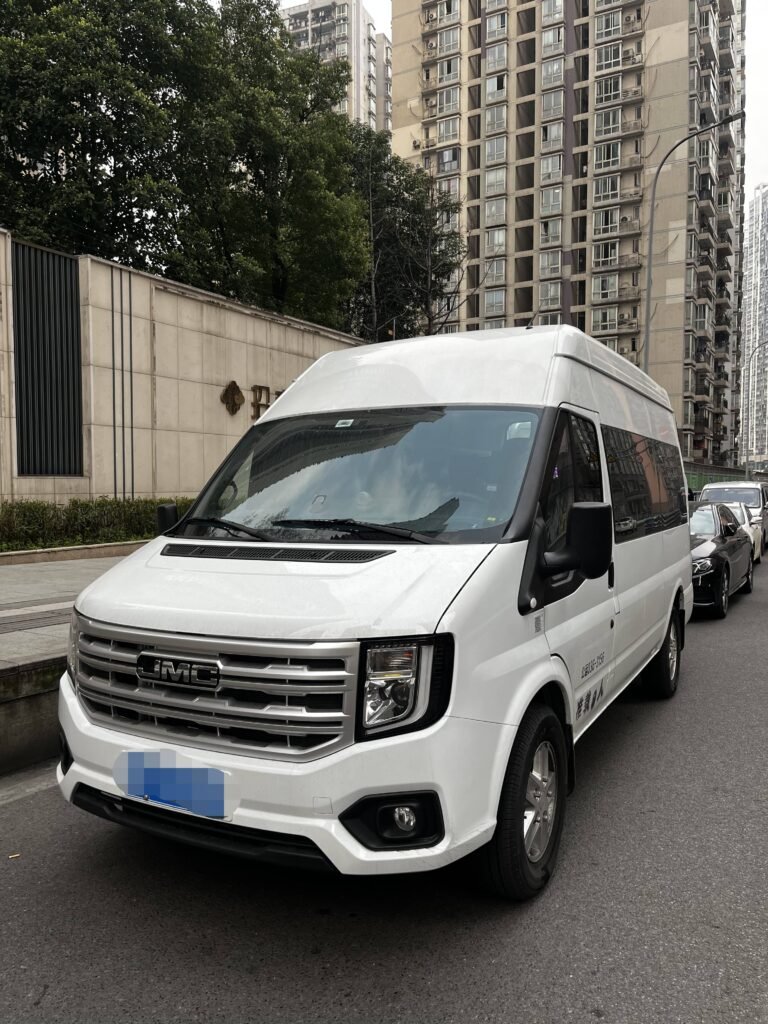 White 9-seater van with private driver in Chongqing